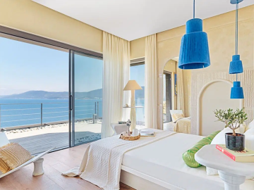 bright-bedroom-with-sea-view-balcony