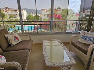 pool-facing-glassed-in-balcony
