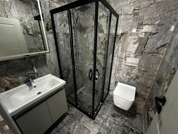 fully-tiled-bathroom