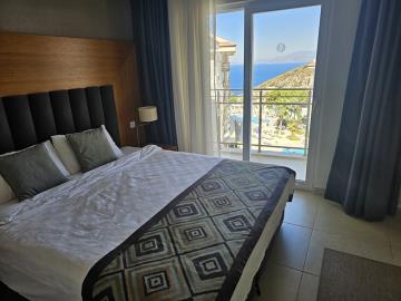 sea-and-pool-view-from-bedroom-balcony