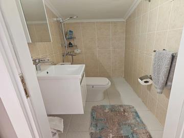fully-tiled-bathroom