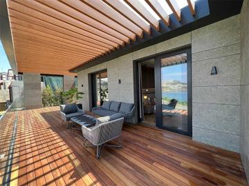 large-balcony-leading-off-bedroom