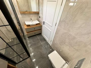 fully-tiled-bathroom