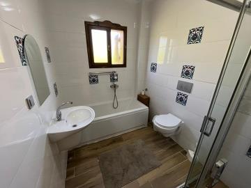 fully-tiled-bathroom