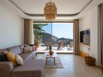 lounge-with-access-to-terrace-and-pool