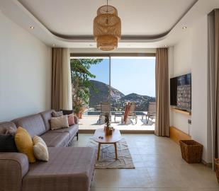 lounge-with-access-to-terrace-and-pool