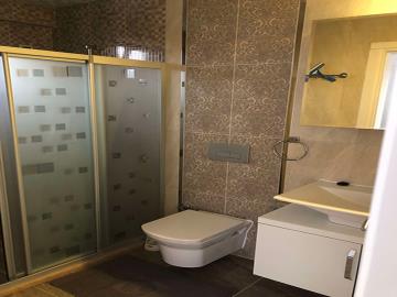 fully-tiled-bathroom