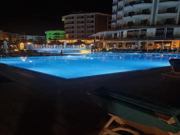 TC1970-communal-pool-area-at-night