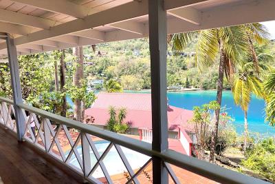 St-Lucia-Homes---Hibiscus-Villa---living-balcony-pool