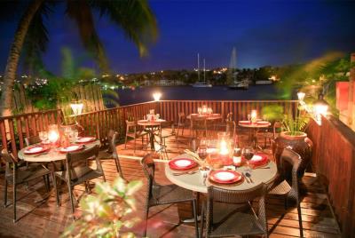 St-Lucia-Home-Real-Estate-Restaurant-Tapas-on-the-Bay-Nightime-setting-3-850x570