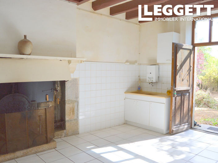 Image No.2-Maison de 2 chambres à vendre à Genouillac