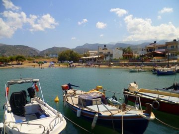 Beach and harbour of Milatos