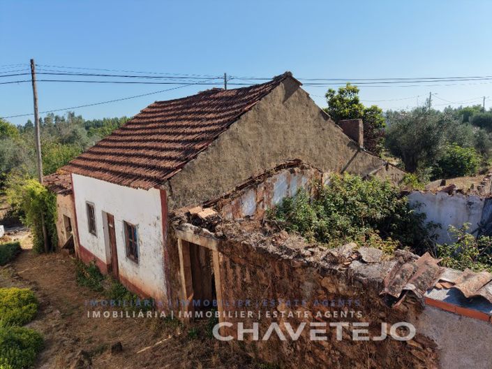 Characterful Stone Renovation Project with Building Land and Mature Olive Grove for sale.