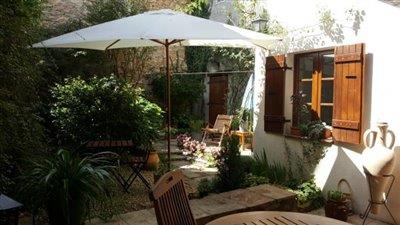 1-5361433_5-uploadsphotomaisondevilleaveccourinterieure-2