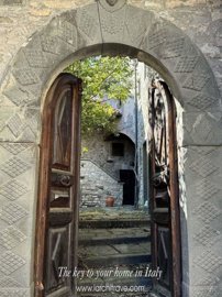 1 - Comano, Maison
