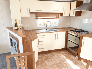 Champagne-and-flutes-in-a-bright-kitchen