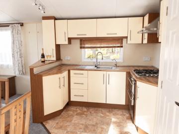 Champagne-on-a-sunlit-cream-kitchen-counter