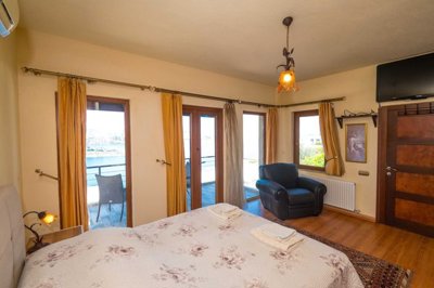 Grand Stone Villa In Bodrum For Sale - Double bedroom out to the beautiful balcony