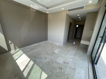 Luxury Antalya Property For Sale - Spacious bedroom with balcony access