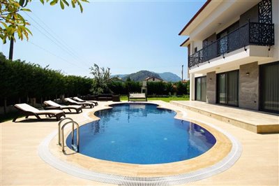 Beautiful five-Bedroom Villa In Dalyan For Sale - Side view of pool and terraces
