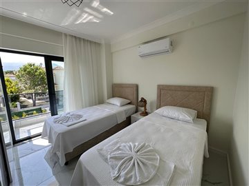 Impressive 3-Bedroom Villa In Dalyan For Sale - Twin bedroom with balcony
