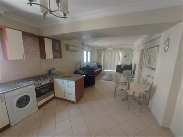 Fantastic location Apartments In Fethiye For Sale - Living area and kitchen