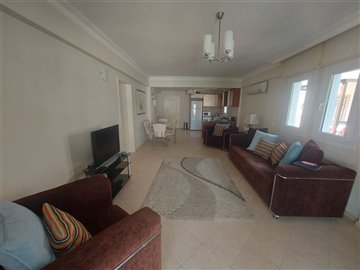 Fantastic location Apartments In Fethiye For Sale - Very spacious lounge and through to kitchen