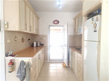 Unique Gumuskaya Yalikavak Property For Sale - Fully fitted kitchen with access to gardens