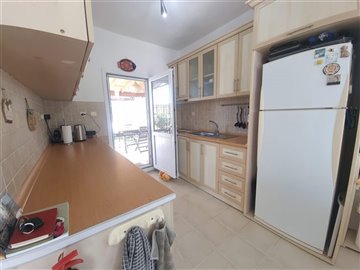 Unique Gumuskaya Yalikavak Property For Sale - Ample worktop and cabinet space in kitchen