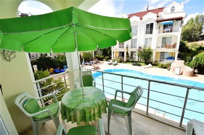 2 Bed Apartment In Fethiye For Sale - Lovely balcony overlooking the communal pool