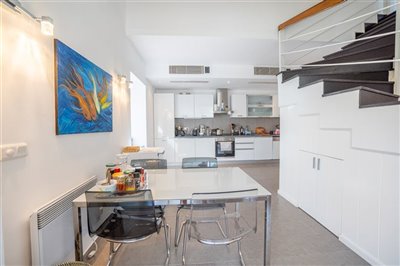 Spacious Modern Fethiye Seafront Apartment For Sale - Seating area next to kitchen