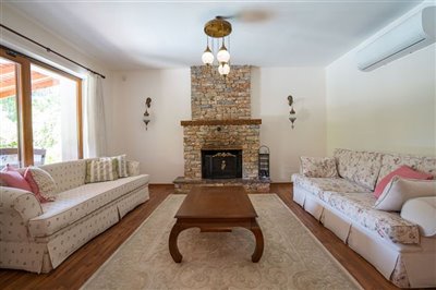 Beautiful Gocek Stone Villa For Sale - Spacious lounge with fireplace