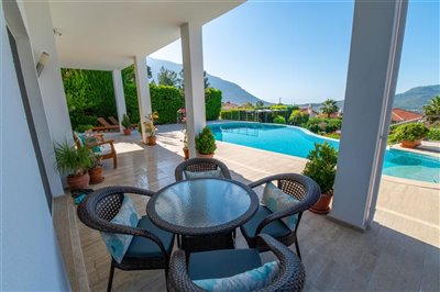Exquisite Fethiye Detached Villa In Ovacik With A Private Pool For Sale - Shady seating near pool