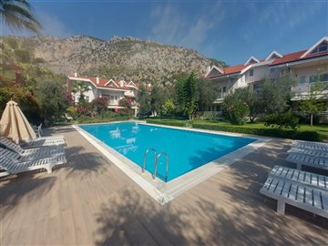 Beautiful Duplex Garden Apartment  in Gocek For Sale - Large communal pool and sunbathing terraces