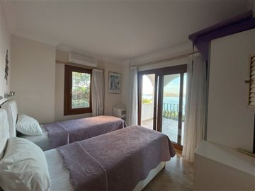 Beautiful Bodrum Apartment For Sale - Twin bedroom with balcony access