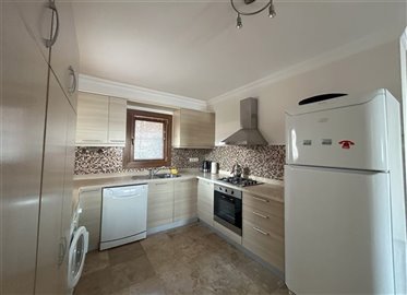 Beautiful Bodrum Apartment For Sale - Lovely kitchen with ample storage