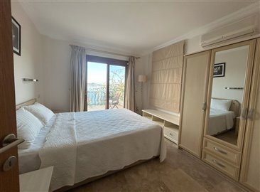 Beautiful Bodrum Apartment For Sale - Spacious double bedroom with ensuite and balcony access