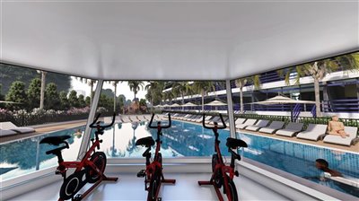 Impressive Antalya Apartments For Sale - Gym with a view to the outdoor pool