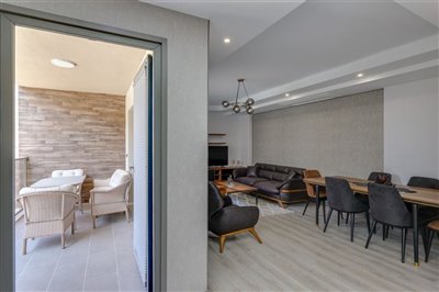 Newly Built Kusadasi Apartments with On-Complex Facilities for Sale - View from kitchen to lounge and balcony