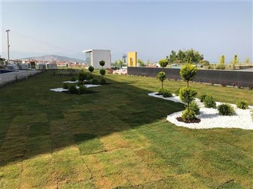 Newly Built, Sea and City View Kusadasi Apartments For Sale - Lush green communal gardens