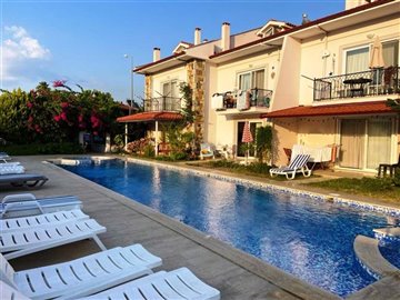 Stylish four-bedroom Duplex Apartment in Dalyan For Sale - Main view of apartment and pool