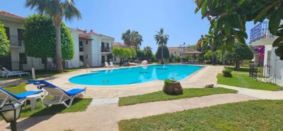 Delightful Garden Floor Apartment In Fethiye For Sale - Shared pool, lush lawns in the gorgeous exterior