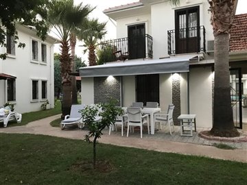 Delightful Ground Floor Two Bedroom Apartment In Fethiye For Sale - Pretty gardens and seating patios