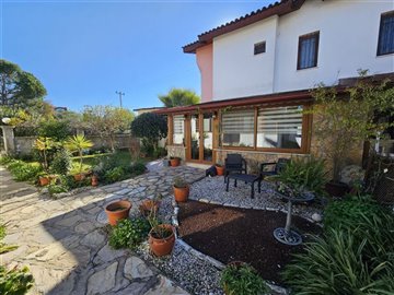 Idyllic Fethiye Semi-Detached Villa For Sale – Main view of villa and gardens