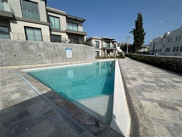 Impeccable Bodrum Apartment For Sale - View of apartment and communal pool