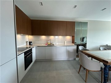 Impeccable Bodrum Apartment For Sale - Modern kitchen and dining set