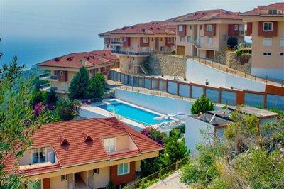 Immaculate Sea View 3-Bed Apartment For Sale In Kargicak - View of the complex with sea views