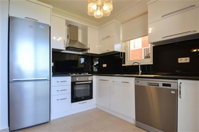 Immaculate Sea View 3-Bed Apartment For Sale In Kargicak - Modern fully fitted kitchen with white goods included