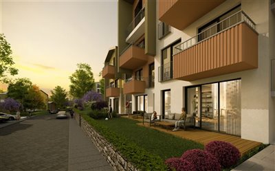 Enchanting Off-Plan Kusadasi Apartments For Sale - Apartment gardens and quiet road