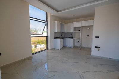 Newly Built, Modern Alanya Property For Sale – Open-plan living space and kitchen